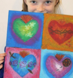 Students working on art projects at the Atelier
